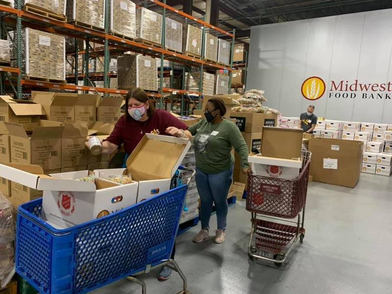 RAS Staff loading food in boxes